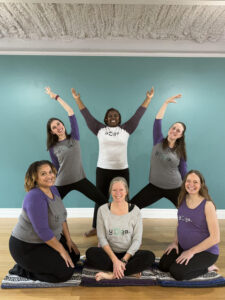 Group photo of the instructors at Full Circle Yoga KC
