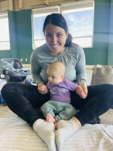 mom and baby at a Bring Your Baby Yoga Class